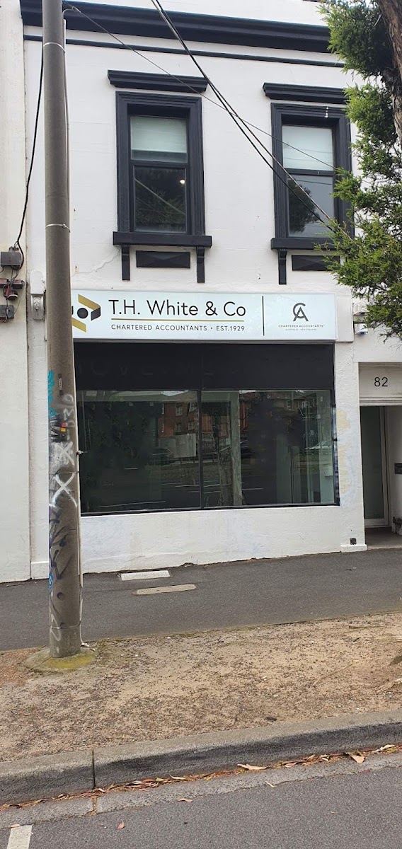 TH White & Co